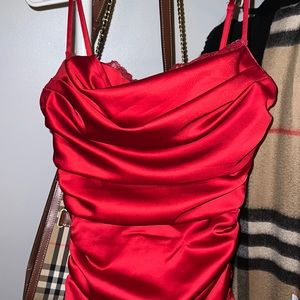 I am selling a short red dress from Oh Polly dress a size 4 uk.